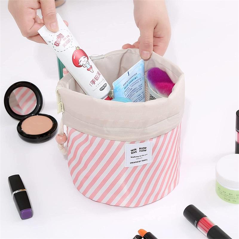 Offre spéciale cordon de serrage rayure cosmétique maquillage brosse sac en forme de baril voyage maquillage organisateur sacs pour les femmes